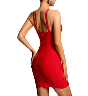 Red dress with open back on a model against a gradient background