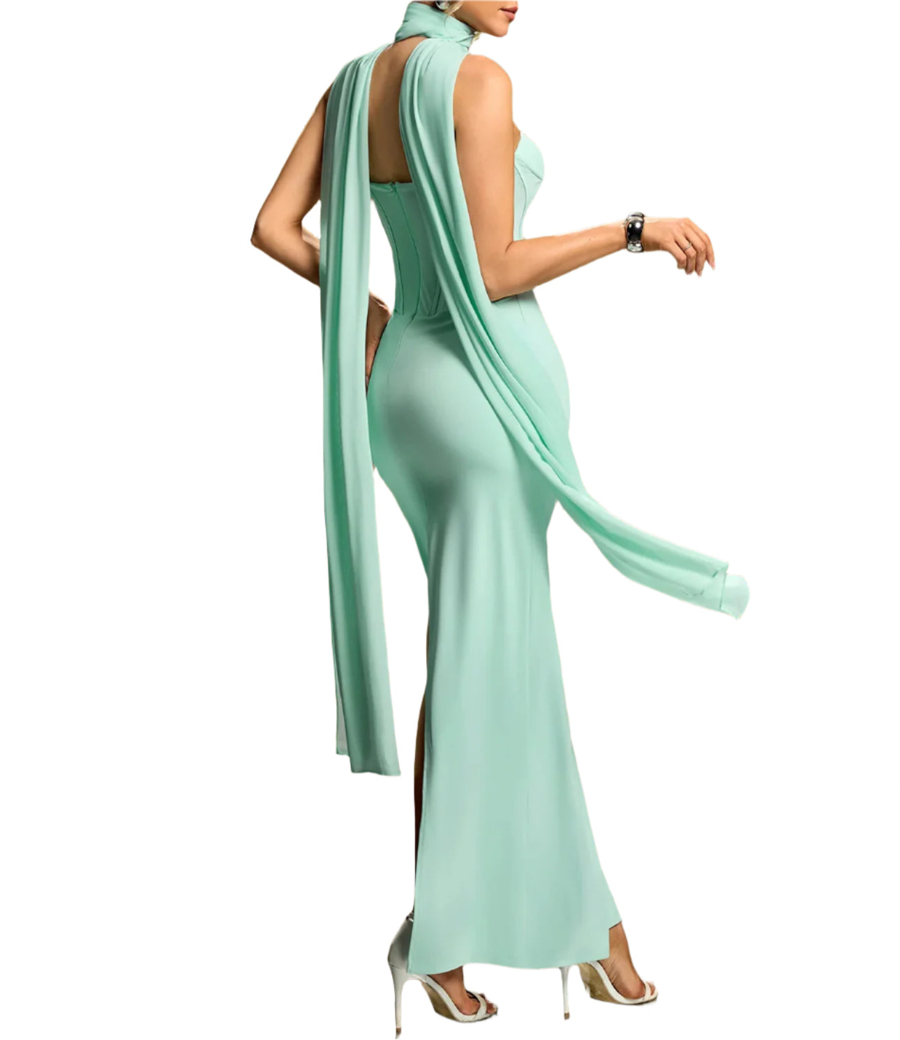 Mint green evening gown with a draped effect on a gradient background