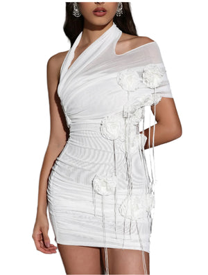 White dress with floral details on a gray background