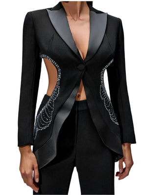 Black blazer with silver embellishments on a gray background